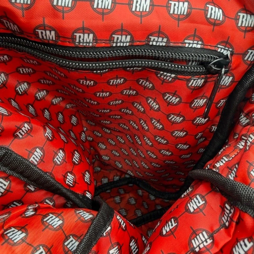 The Running Man TRM Mini Backpack / Sling‎ Bag – NWOT